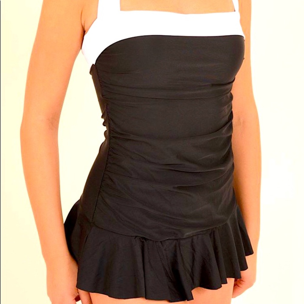 Woman’s swimsuit large 12-14.   Used a few times